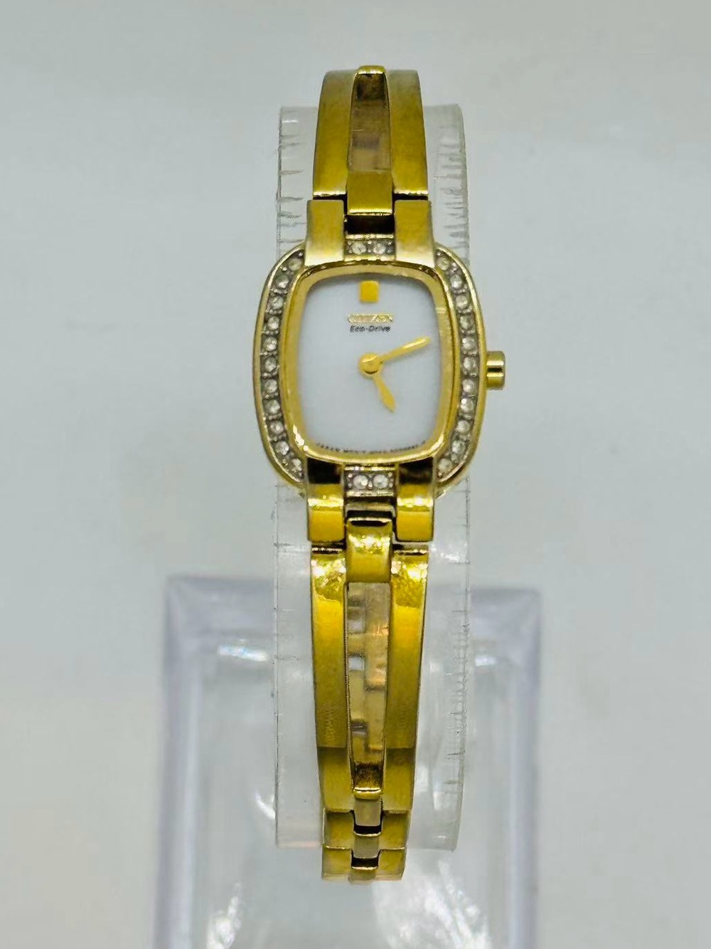 Citizen Eco-Drive Women’s Gold Tone Watch Crystal Accent 17mm White Dial Runs